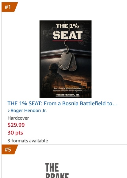 Amazon Hot New Releases snapshot — THE 1% SEAT at #1